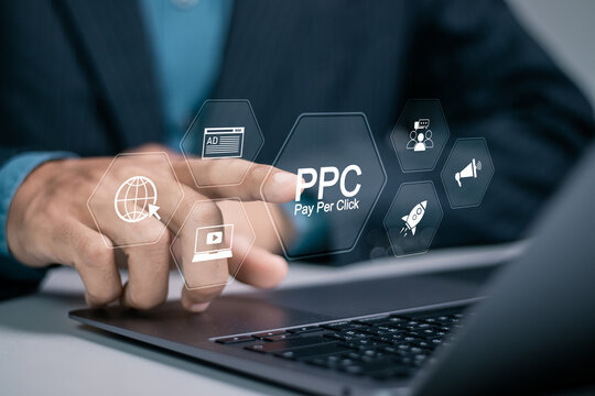 Businessman using a laptop with a digital overlay of PPC (Pay Per Click) advertising icons, including a browser, ad, video, megaphone, and rocket launch symbols.